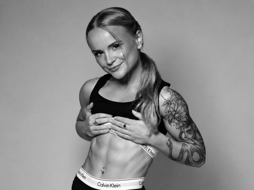 Personal trainer Aurelija in a black and white studio portrait